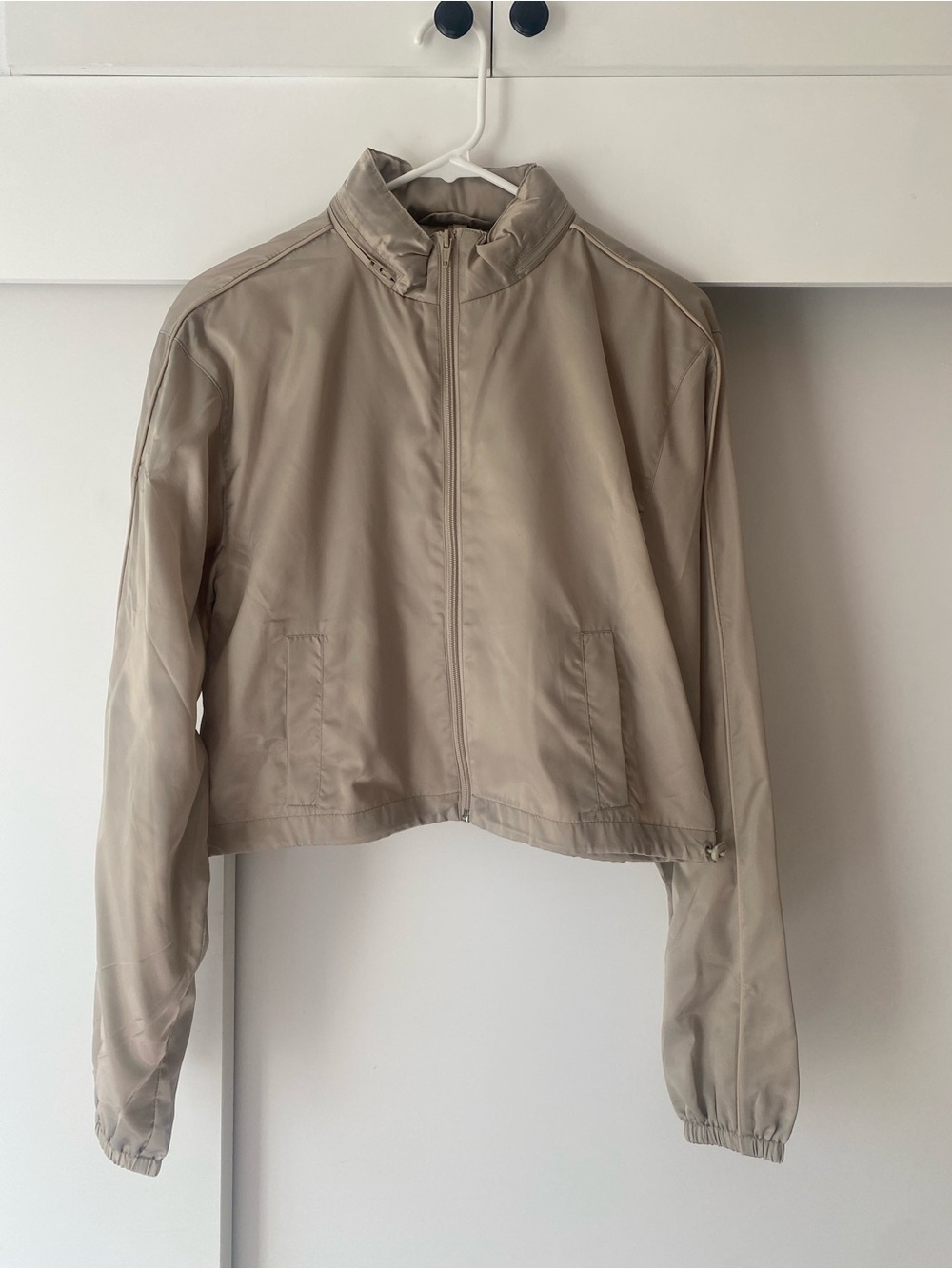 SKIMS Light Taupe Cropped Windbreaker Jacket